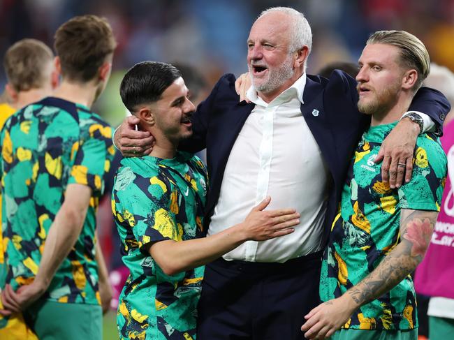 AL WAKRAH, QATAR - NOVEMBER 30: Graham Arnold, Head Coach of Australia, is congratulated by his players after their 1-0 victory in the FIFA World Cup Qatar 2022 Group D match between Australia and Denmark at Al Janoub Stadium on November 30, 2022 in Al Wakrah, Qatar. (Photo by Alex Grimm/Getty Images)