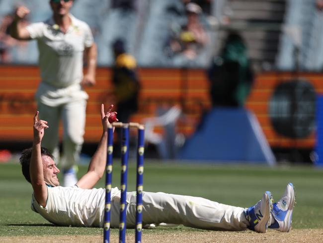 Pat Cummins enjoys his caught-and-bowled to remove Abdulah Shafique. Picture: Michael Klein