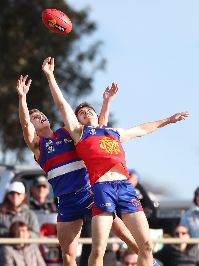 Pyramid Hill’s Steven Gunther and Marong’s Jack McCaig fly for a mark.