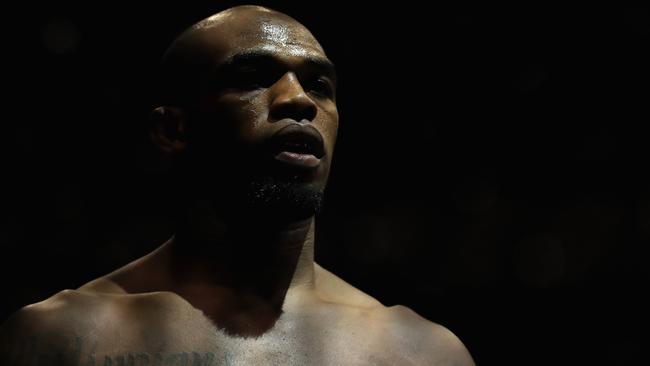 Jon Jones looks on prior to his fight against Daniel Cormier at UFC 214.