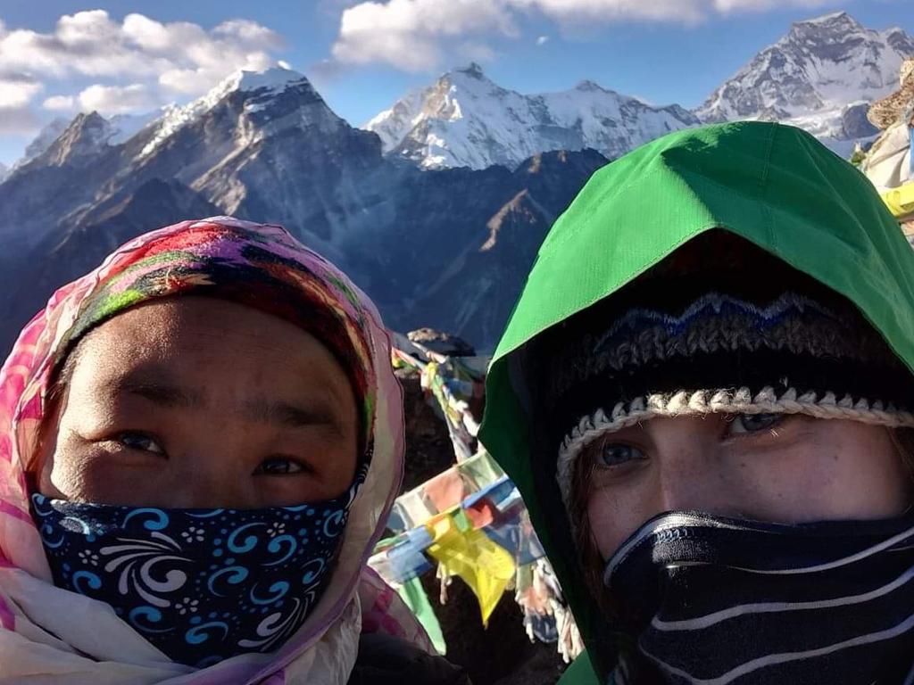 Sian Webster with her guide Pasang Sherpa on the Everest base camp trail a few months before she contracted Covid-19. Picture: Supplied