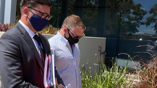 Mitchell Anthony Ralston (right) leaves Southport Court with his lawyer Michael Gatenby, of Gatenby Criminal Lawyers. Picture: Lea Emery