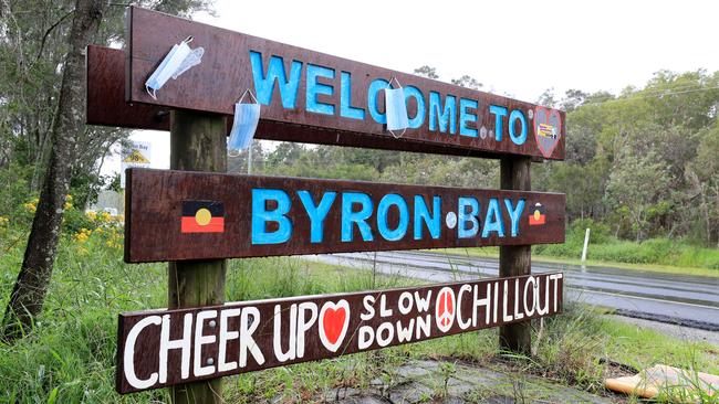 BYRON BAY , AUSTRALIA - NewsWire Photos March 30, 2021: The welcome to Byron Bay sign is adorned with medical face masks in a form of protest. Picture: NCA NewsWire / Scott Powick