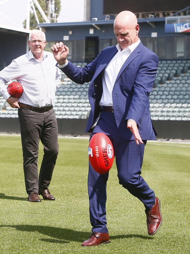 Premier Peter Gutwein kicking a football with Errol Stewart at UTAS Stadium in Launceston. AFL task force announcement. Picture: PATRICK GEE