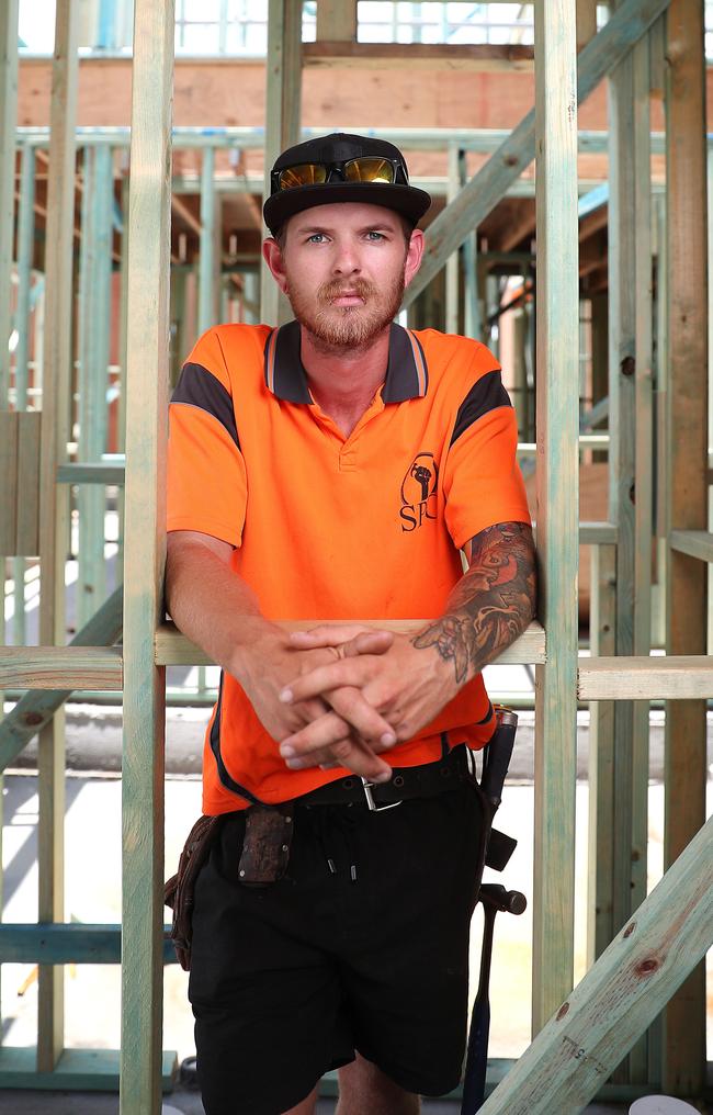 Carpenter Steve Purcell on a job site at Ripley in Ipswich. Picture: Peter Wallis