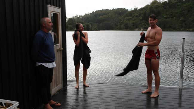 Floating Sauna Lake Derby owner Nigel Reeves (left) with guests. Picture: PIP DE ROHAN