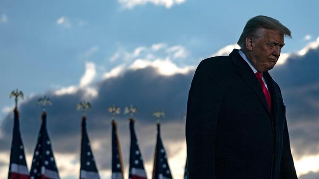 Outgoing US President Donald Trump addresses guests at Joint Base Andrews in Maryland on January 20. Picture: AFP