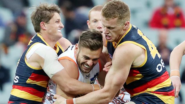 The Crows swarmed the Giants early with brutal attack on the man and the footy. Picture: Sarah Reed