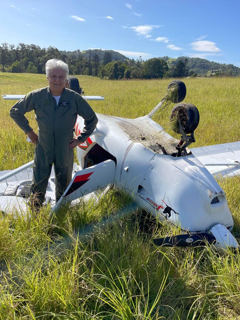 Pilot Vic Pisani next to his crashed plane in 2022, which was involved in the mid-air collision on Saturday. Picture: Matt Frost