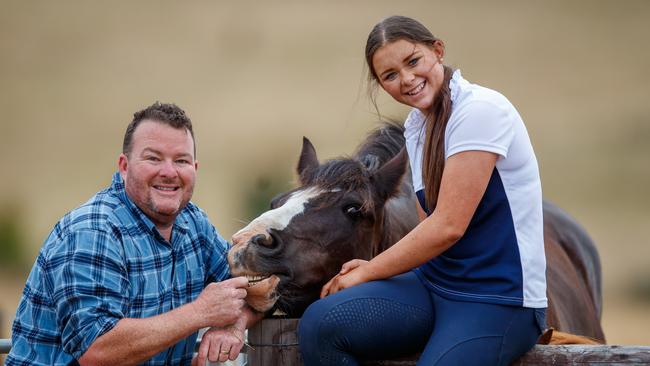 Costello with daughter Matilda and horses Molly and Winnie, on their farm at Harrogate. Picture Matt Turner.