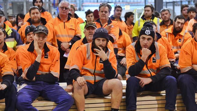 The Labor Government has reached agreement with the ASH shareholders to buy the Heyfield Timber Mill. ASH workers gather for the announcement of the government take over. Picture: Tony Gough