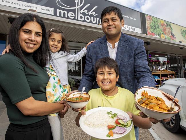 A young indian family in Wallan which runs the Ohh Melbourne Indian restaurant are giving way for free - hearty nightly meals every night to elderly people in their area and beyond - even to Craigeburn etc - from 5 to 7 - and have volunteers who can deliver if the elderly are too frail to collect the meals. They introduced it yesterday after seeing so many elderly in their community worrying about going hungry. They have $6000 rent a month to pay and young kids as it is - and say they are doing it tough - but would rather go without themselves than see old people go hungry. Amar Tiwari and Chaman Preet with kids Aarav, 7 and Jaysha, 3. Picture: Tim Carrafa