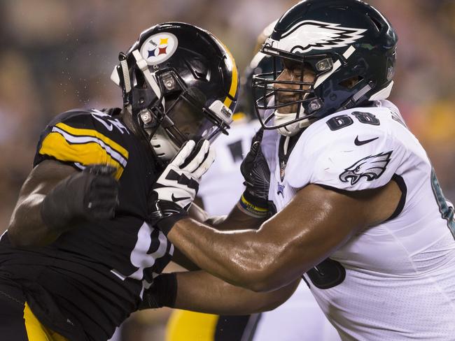 Ola Adeniyi of the Pittsburgh Steelers rushes into Jordan Mailata.