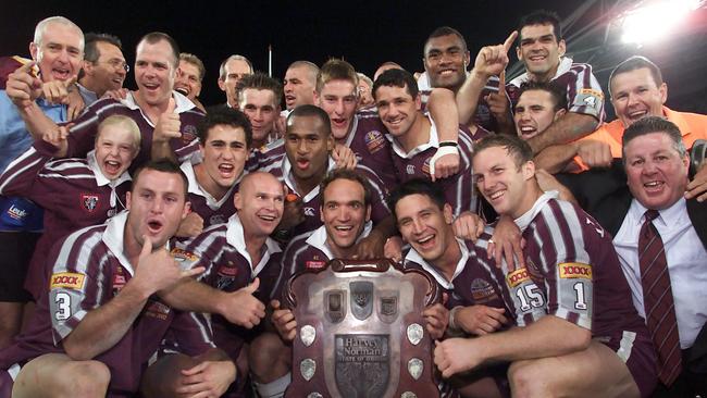 The Maroons celebrate victory in 2002.