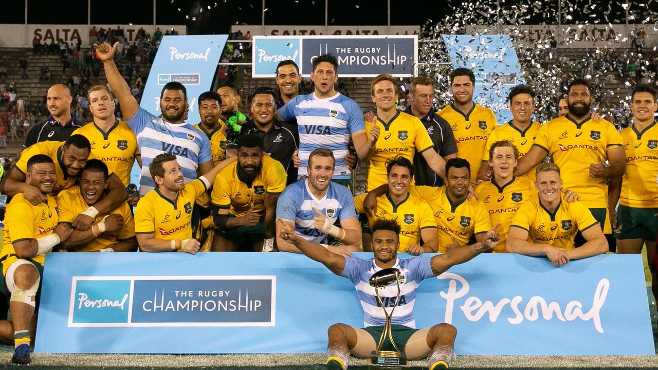 Australia celebrate with the silverware after the incredible comeback in Salta.