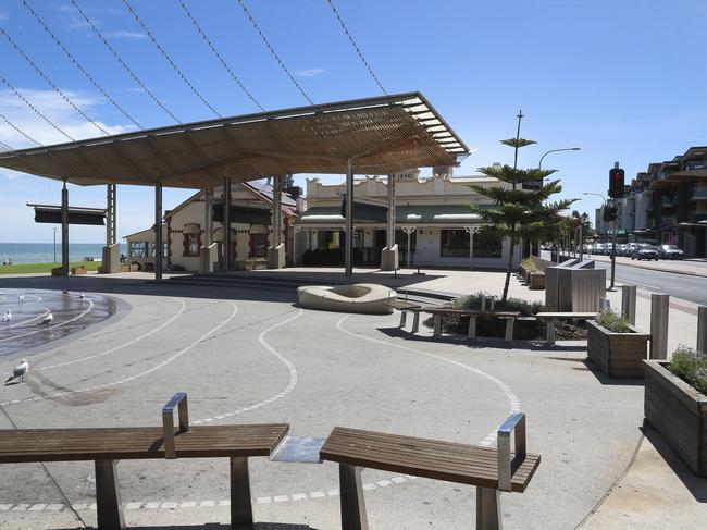 Normally thriving, Henley Square was all-but-abandoned as restrictions on public gatherings at pubs, clubs and restaurants came into effect on Monday. Picture SARAH REED