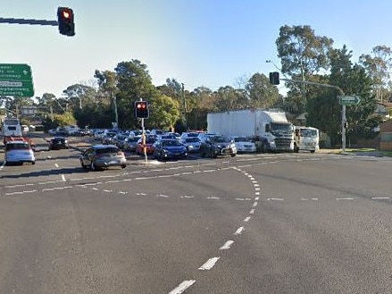 An elderly woman was trapped inside car following two-car crash on Wattle Grove Dr and Nuwarra Rd.