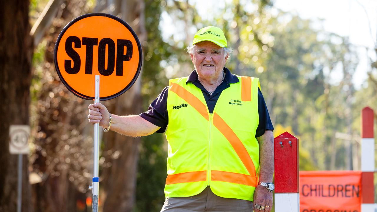 Crossing Supervisor John Goulden doing his job at the crossing near Mt Dandenong Primary School. He has been banned from high-fiving kids. Picture: Jason Edwards