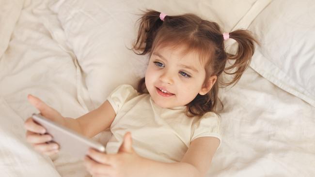 If we are on our phones all the time, mindlessly scrolling through social media, what message does that send to children? Picture: Istock