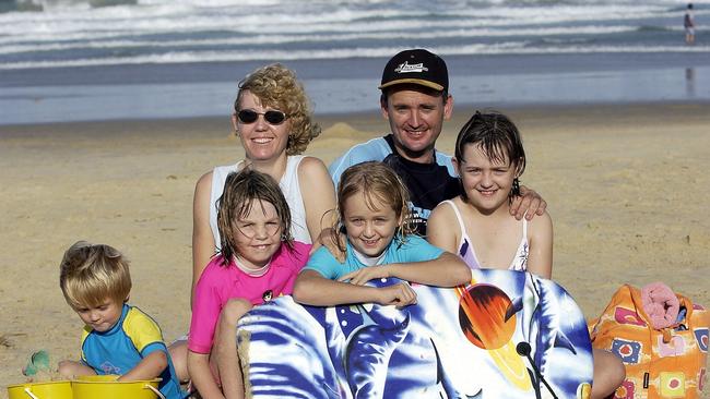 Georgia Collier pictured here at Coolum Beach with her family (L-R) brother Liam, sister Stacey, Mum Tania, Dad Alan and sister Emily, in 2003.