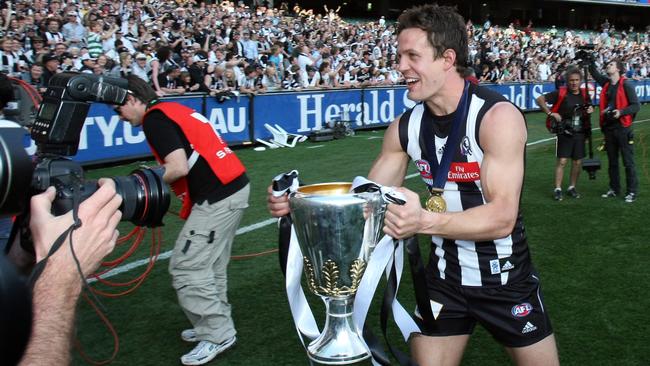 Luke Ball with the premiership cup after Collingwood’s Grand Final win in 2010.