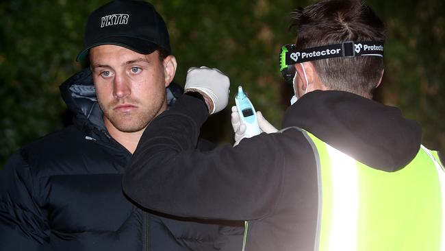 Cameron Munster has his temperature checked before training. Photo: Robert Cianflone/Getty Images