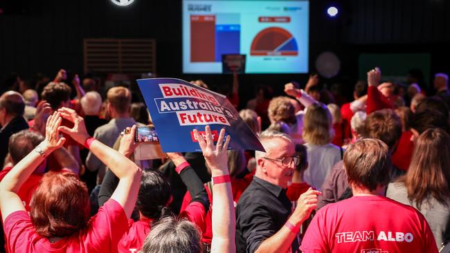 Labor Party supporters in Sydney cheer as the ABC projected a federal election win on May 3. Picture: Getty Images