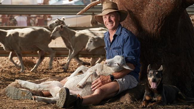 Farmer Andy Gilfillan with his dog, Spark at his farm on Kangaroo Island. Picture: Matt Loxton