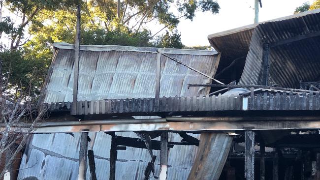 The back of a property in Aranda Dr, Frenchs Forest that was destroyed by fire. Picture: Julie Cross