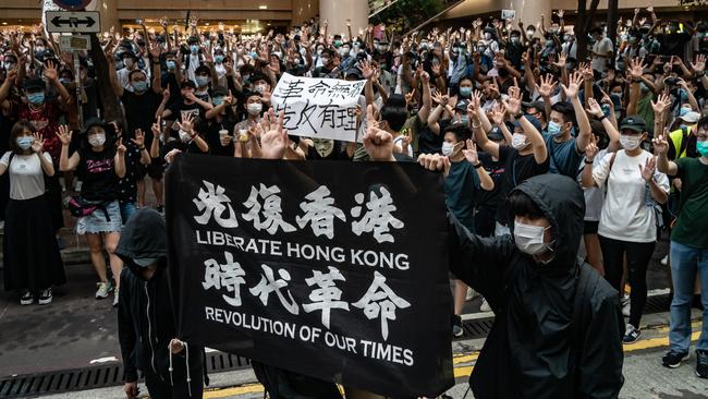 Protesters rally against the new law in Hong Kong. Picture: Getty Images