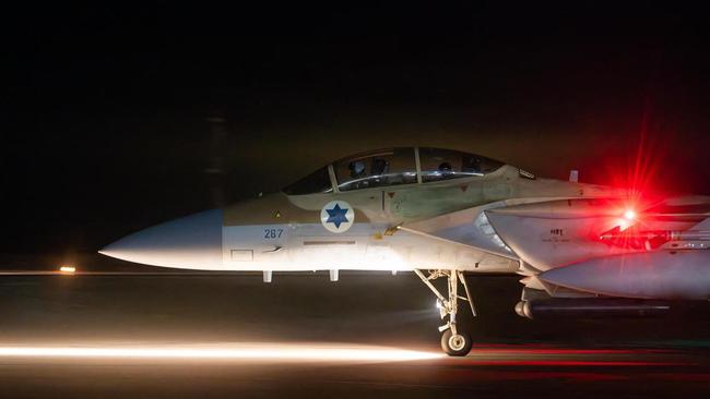 An Israeli fighter jet returns after a mission to intercept the barrage of drones and missiles dispatched by Iran and its proxies on Saturday night. Picture: AFP