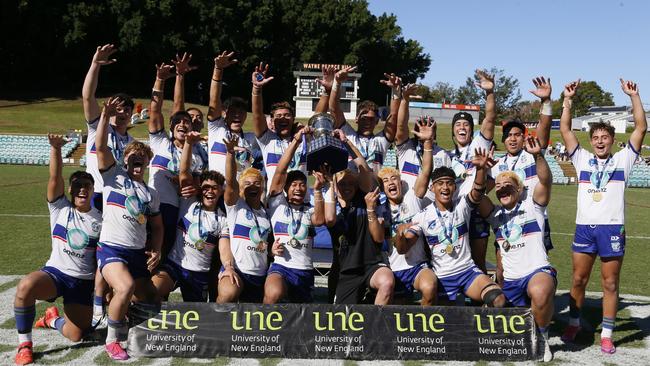 New Zealand Warriors celebrate their victory after the Harold Matthews Cup grand final against Newcastle Knights. Photo: Warren Gannon Photography