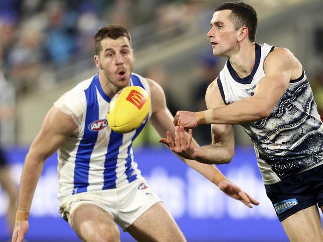 Mark O'Connor fires off a handball. Picture: Martin Keep/AFL Photos via Getty Images