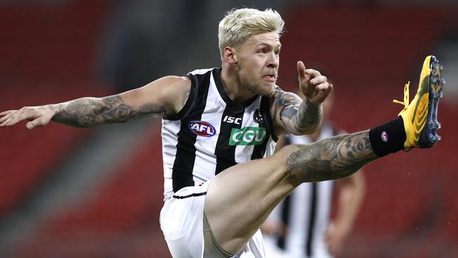 Collingwood’s Jordan De Goey has been charged with indecent assault.