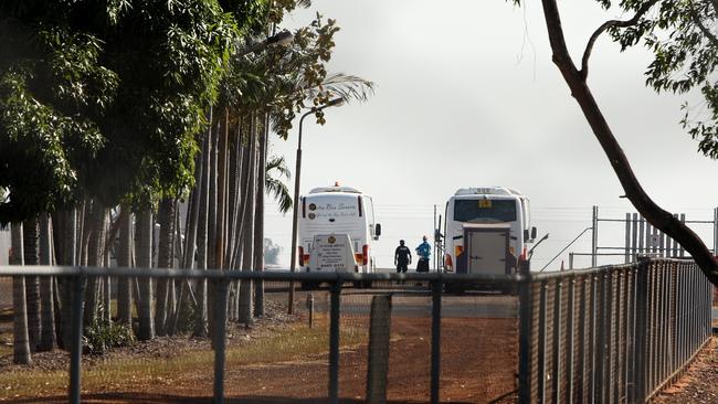 Passengers from Qantas flight QF112 are transported to the Howard Springs quarantine facility on-board waiting buses. The flight from New Delhi is the first repatriation flight for Australians who have been stranded in India following the lifting of the federal government's ban. Picture: Steven Hoare/Getty Images