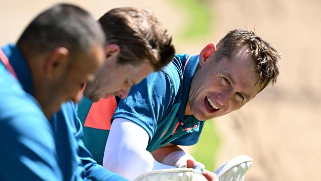 Marnus Labuschagne (R) shares a laugh with teammate Usman Khawaja on Christmas Eve. Picture: AFP