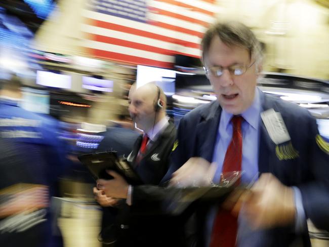 A trader works at the New York Stock Exchange, Tuesday, Feb. 9, 2016. Stock markets have been in a slump so far this year after a lackluster 2015. Several factors have kept investors in a selling mood, including falling crude oil prices, waning growth in major economies and the prospect of Federal Reserve rate hikes after several years of ultra-easy monetary policy. (AP Photo/Mark Lennihan)