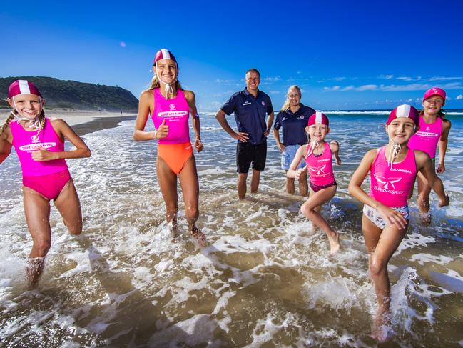 2032 SLS Ambassadors Trevor Hendy and Karla Gilbert with nippers Evie Glore 10 (plaits), Soraya Glore, 12 (orange bathers), Emily Brown, 8 (maroon bathers), Cleo Glore, 8 (white bathers) and Alexandra Mair, 11 (hat).Picture: Nigel Hallett