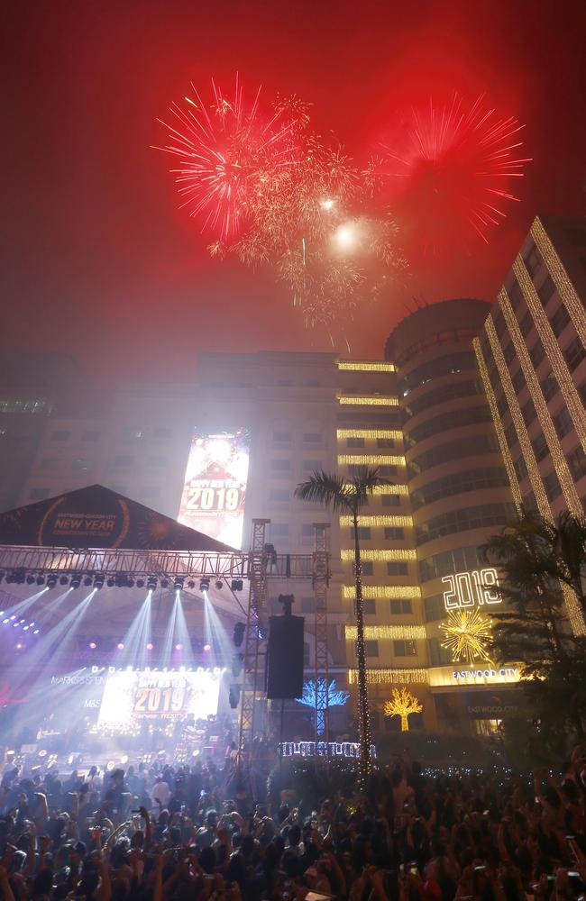 Fireworks light up the sky at the Eastwood Shopping Mall as Filipinos welcome the New Year Tuesday, Jan. 1, 2019 in suburban Quezon city northeast of Manila. Picture: AP