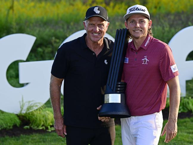 SUGAR GROVE, ILLINOIS - SEPTEMBER 18: Team Captain Cameron Smith of Punch GC poses with Greg Norman, CEO and commissioner of LIV Golf, after winning the individual title during Day Three of the LIV Golf Invitational - Chicago at Rich Harvest Farms on September 18, 2022 in Sugar Grove, Illinois.   Quinn Harris/Getty Images/AFP