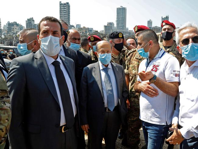 Lebanon's President Michel Aoun, centre, visits the site of the massive explosion. Picture: AFP