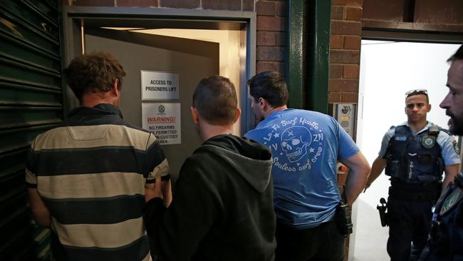 He was later taken to Manly Police Station. Picture: Toby Zerna