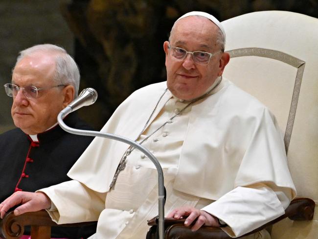 (FILES) Pope Francis holds a weekly general audience at Paul-VI hall in the Vatican on January 22, 2025. Pope Francis has "stable" conditions with his blood tests showing a "slight improvement", the Vatican said on February 19, 2025, as the 88-year-old pontiff undergoes ongoing treatment for bronchitis in both lungs. (Photo by Andreas SOLARO / AFP)