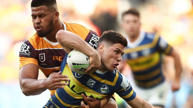 Mitchell Moses of the Eels is tackled by Payne Haas of the Broncos during the Second NRL Elimination Final between the Parramatta Eels and the Brisbane Broncos at Bankwest Stadium in Sydney, Sunday, September 15, 2019. (AAP Image/Brendon Thorne) NO ARCHIVING, EDITORIAL USE ONLY