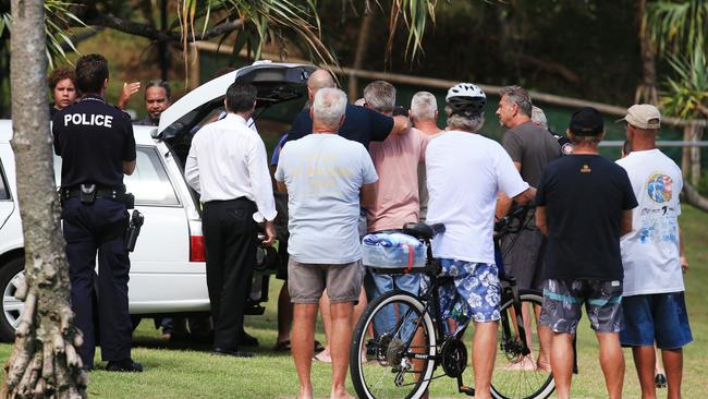 Friends and family comfort each other. Picture: Tweed Daily News