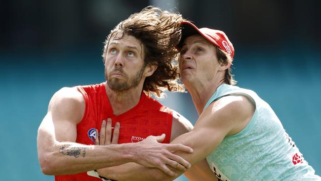 Tom Hickey and Callum Sinclair go head-to-head at Swans training this week ahead of Friday night’s qualifying final. Picture: Phil Hillyard