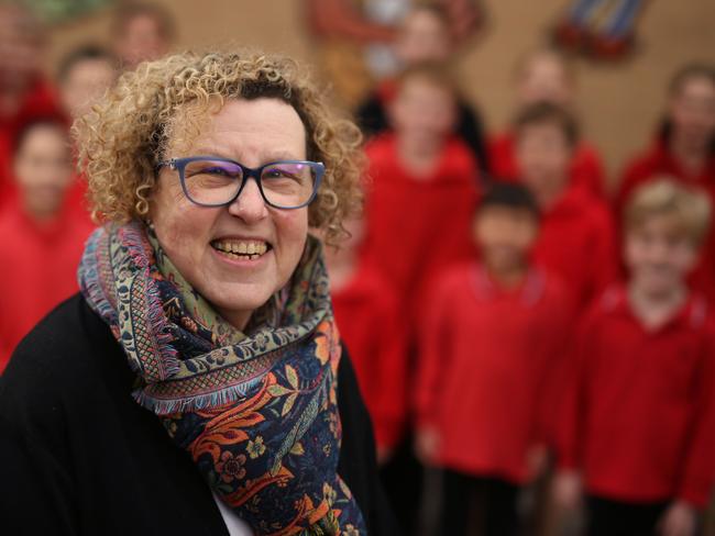 Primary schoolteacher Rita Kollmann with her students. Picture: Stuart Milligan