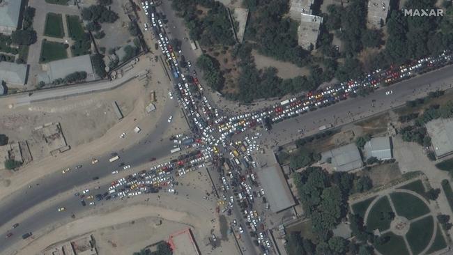 This satellite image released by Maxar Technologies shows a traffic jam and crowds at Kabul’s Hamid Karzai International Airport in Afghanistan. Picture: AFP