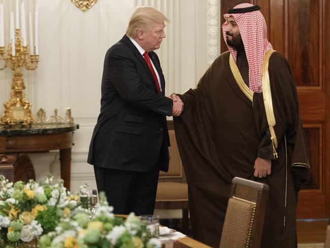 US President Donald Trump shakes hands with Saudi Defence Minister and Deputy Crown Prince Mohammed bin Salman, during a visit to Washington in March. Picture: Evan Vucci/AP