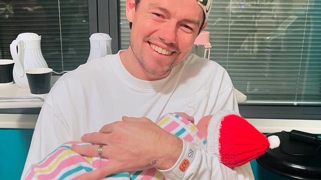 Lachie Neale craddling newborn son, Freddie Oliver Neale. Photo: Instagram.